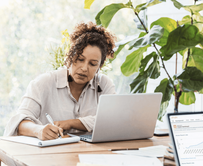 Woman writing reports